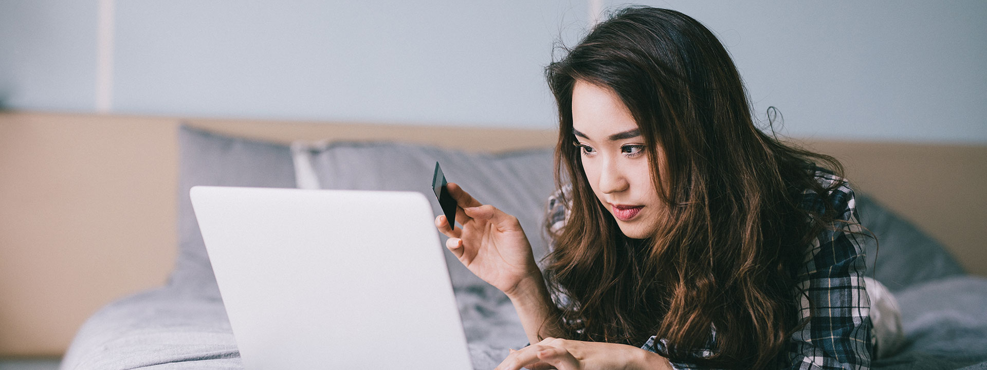 Woman looking at her laptop